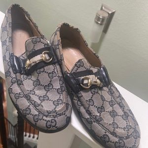 Authentic black and white gucci loafers